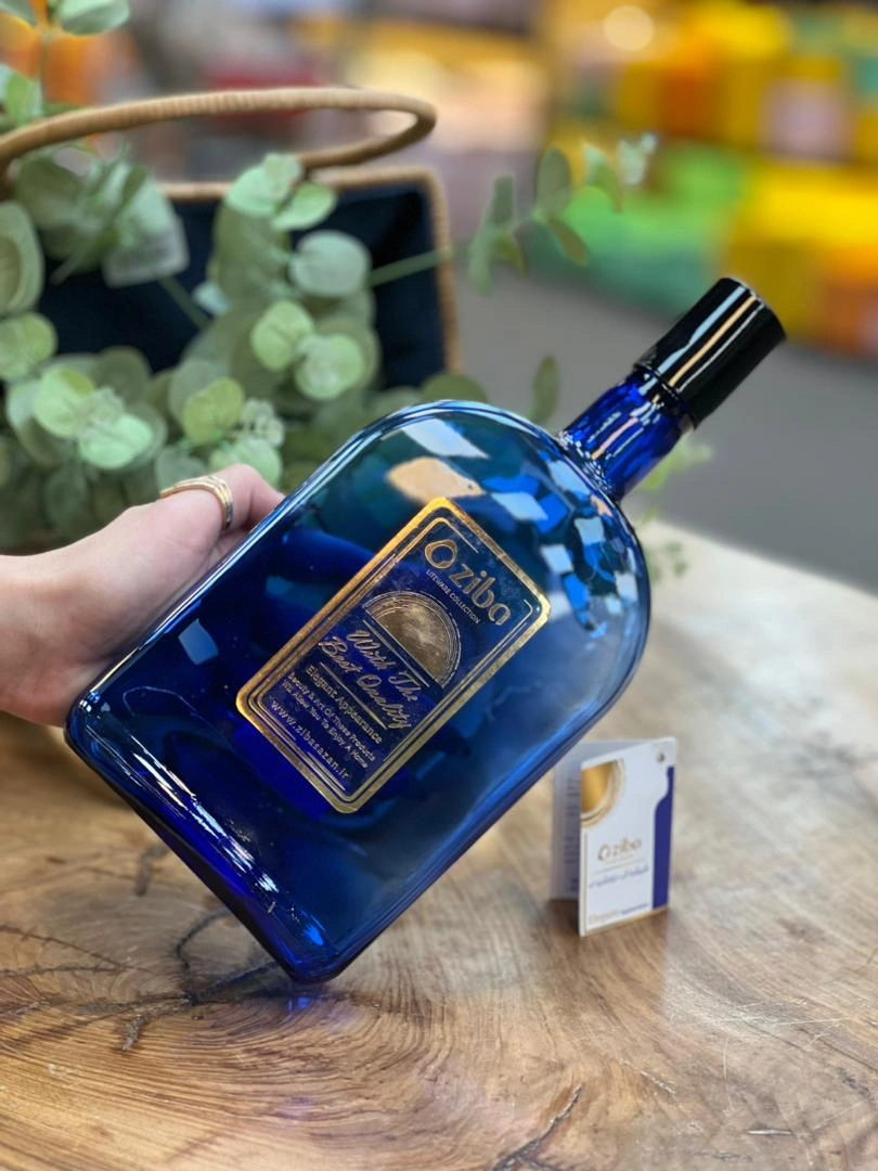 بطری شیشه‌ای آبی کوره‌ای زیباسازان مدل خورشیدی با درب پلاستیکی پیچی و طراحی خاص هایپ