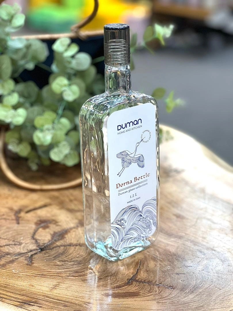 بطری شیشه‌ای کتابی درنا دومان با شیشه شفاف و درب لاکی پیچی