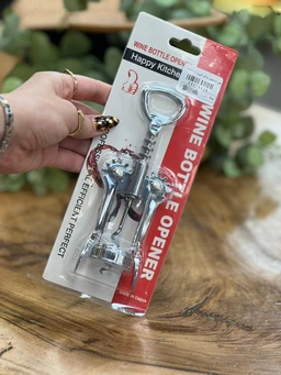 شامپاین باز کن برند Happy Kitchen با طراحی ساده و جنس کروم، مناسب برای استفاده در مهمانی‌ها.