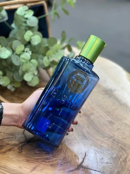 بطری شیشه‌ای آبی دنیز مدل Eight با درب پلاستیکی پیچی و طراحی مدرن یک لیتری